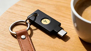 Yubico YubiKey 5 NFC on a keychain for portable security.