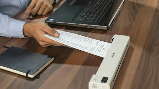 Brother DS-940DW wireless duplex mobile document scanner showing the space-saving U-path feed system.