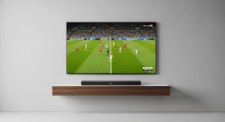 Minimalist TV setup with soundbar under screen for immersive Super Bowl 2026 audio experience.