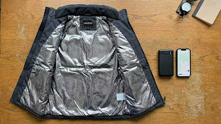 Venustas heated vest interior showing silver Mylar thermal lining for heat retention.