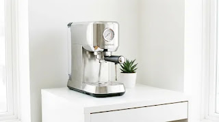 CASABREWS 20 Bar espresso machine with pressure gauge fitting perfectly on a small apartment kitchen counter.