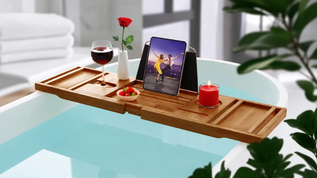 Royal Craft Wood bathtub caddy tray holding a wine glass and iPad securely