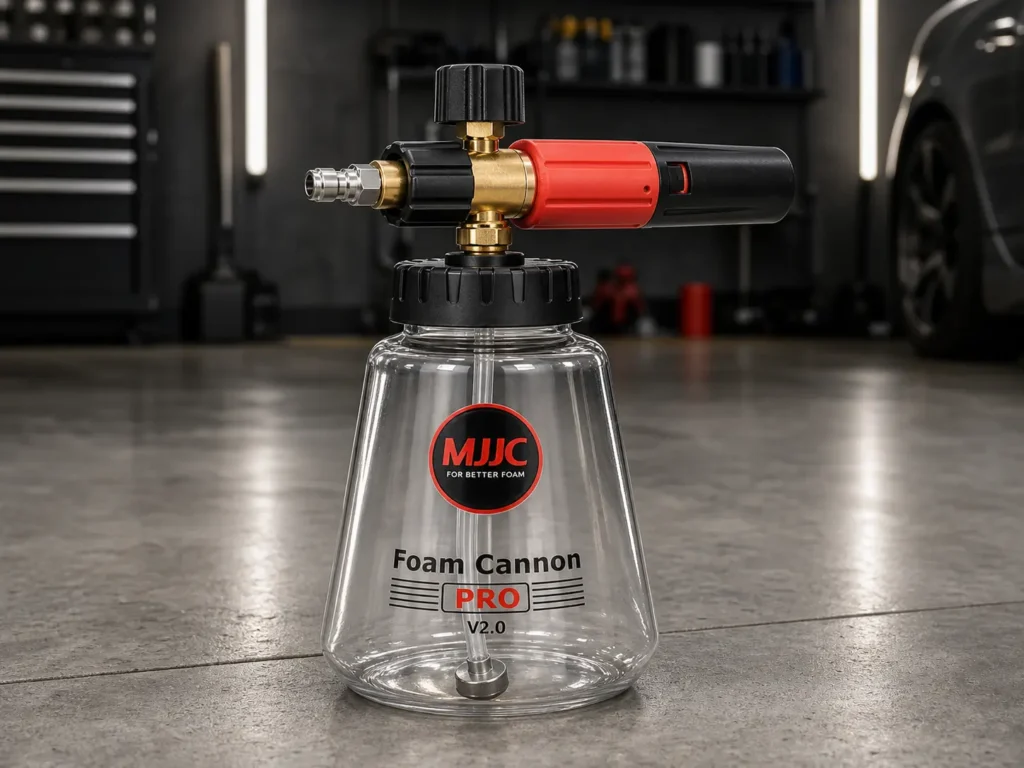 Close-up of the MJJC Foam Cannon Pro V2.0 showing the heavy brass connector and wide bottle design.